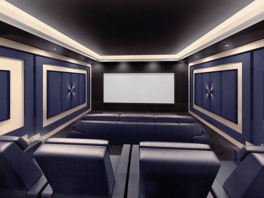 A home theater space featuring seating, acoustic treatments, and a large screen.