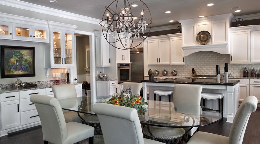 Kitchen with white cabinets and pendant lighting